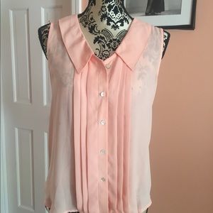 Sleeveless top with pleated front
